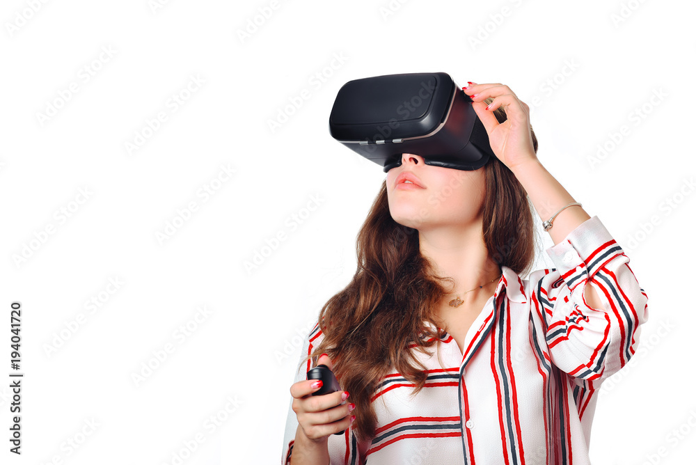 Beautiful woman touching air during the VR. Isolated on white. Beautiful woman touching air during the VR. Isolated on white.