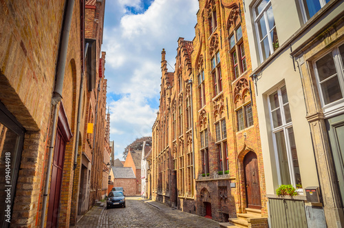 Beautiful narrow streets and traditional houses in the old town of Bruges (Brugge), Belgium