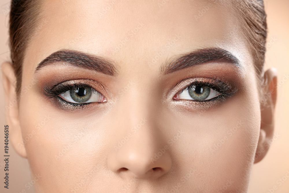 Obraz premium Woman with beautiful makeup, closeup. Professional visage artist work