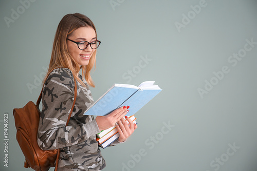 Pretty student studying on ...