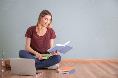 Pretty student with laptop ...