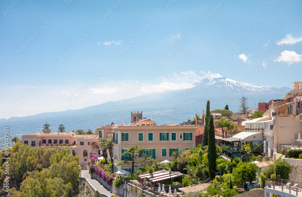 Taormina and the Etna volcano from city park, in Sicily, Italy