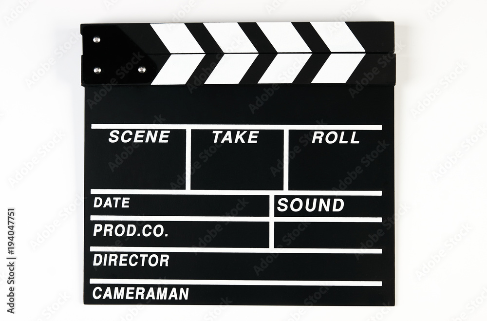 Movie production clapper board. Black clapperboard isolated on white background with copy space, close-up. 