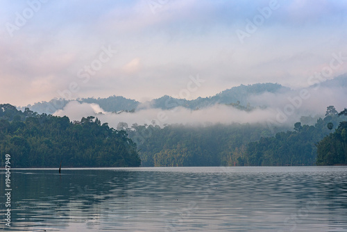 Early morning on the Cheow Lan Lake in the national park Khao Sok in Thailand