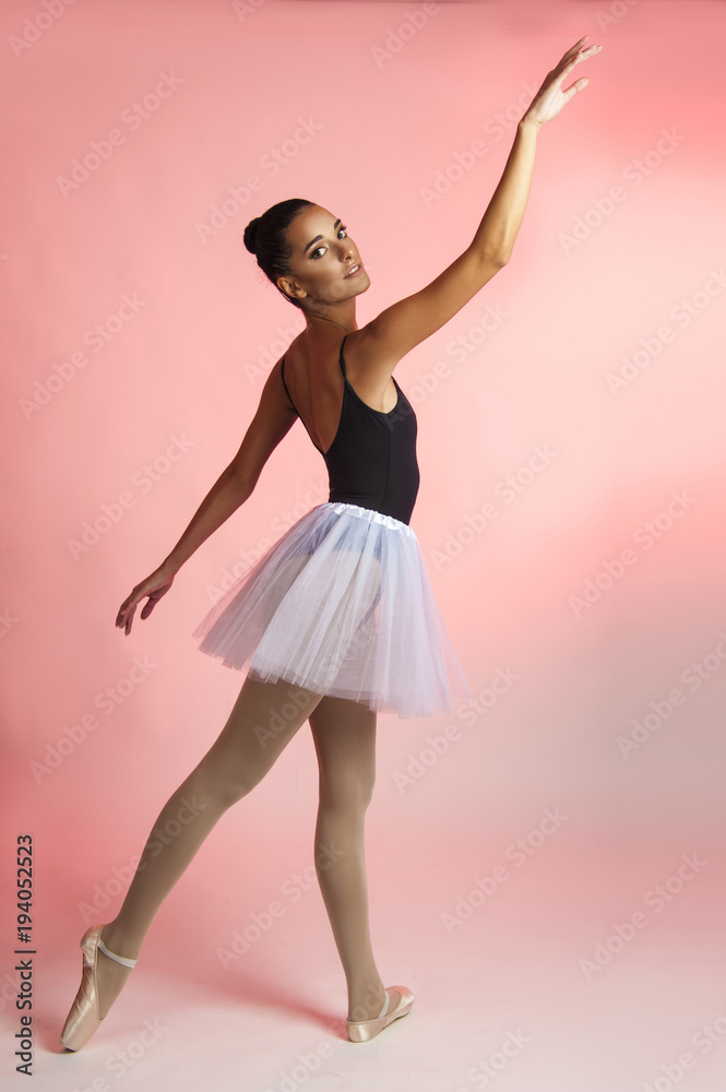 Naklejka premium Ballet dancer female posing in ballet poses 