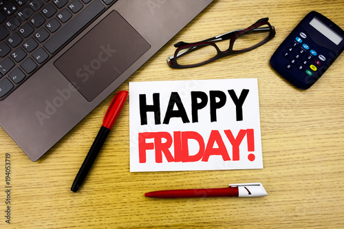 Handwritten text caption showing Happy Friday . Business concept writing for Weekend Welcoming written on paper, wooden background in office with space, marker pen and glasses photo