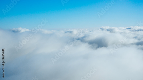 clouds from airplane window. View of the sky above the clouds