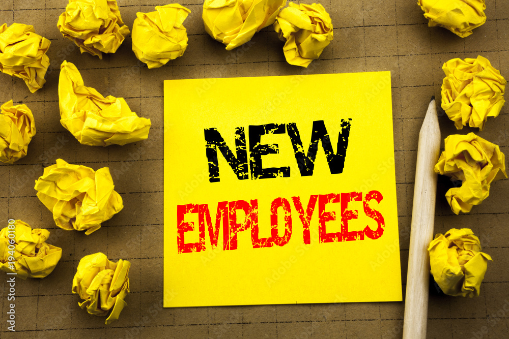 Fototapeta premium Handwriting text showing New Employees. Business concept for Welcome Staf Recruiting written on sticky note paper on the vintage background. Folded yellow papers on the background
