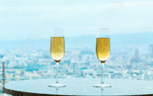 White wine on a table high above the city