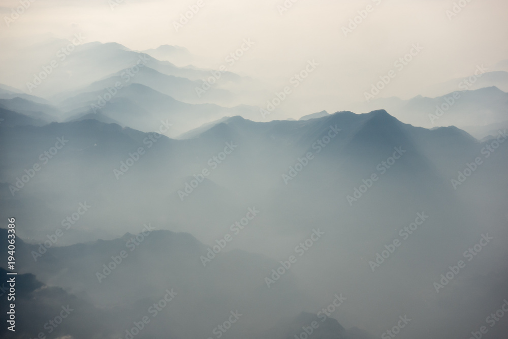 Sun Rays and Rugged Hills