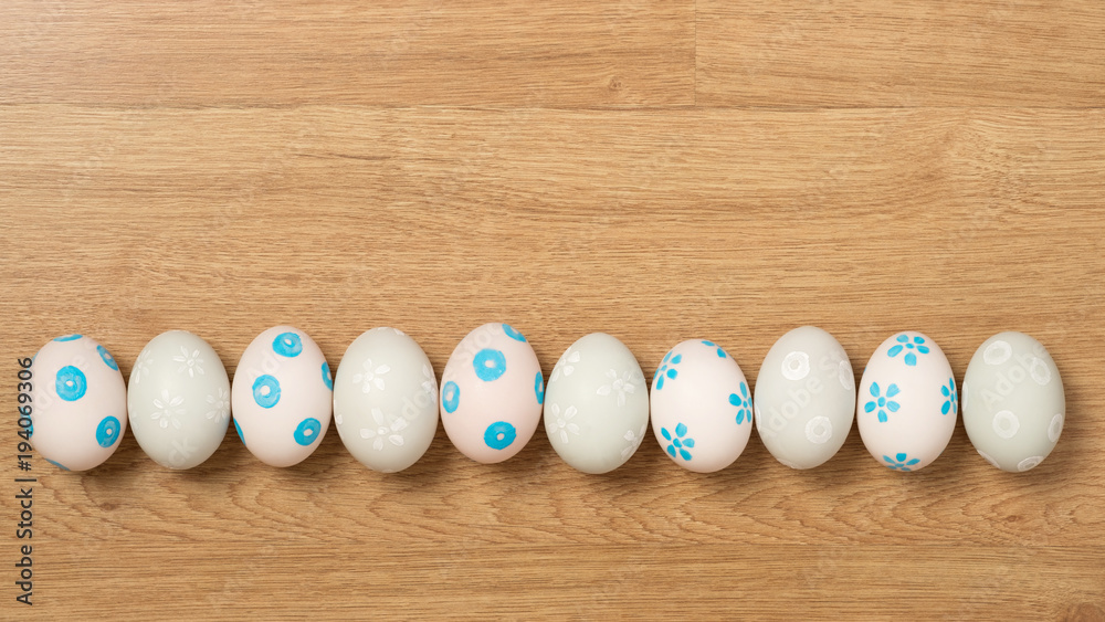 handmade easter eggs a isolated on wooden background. handmade easter eggs a isolated on wooden background.