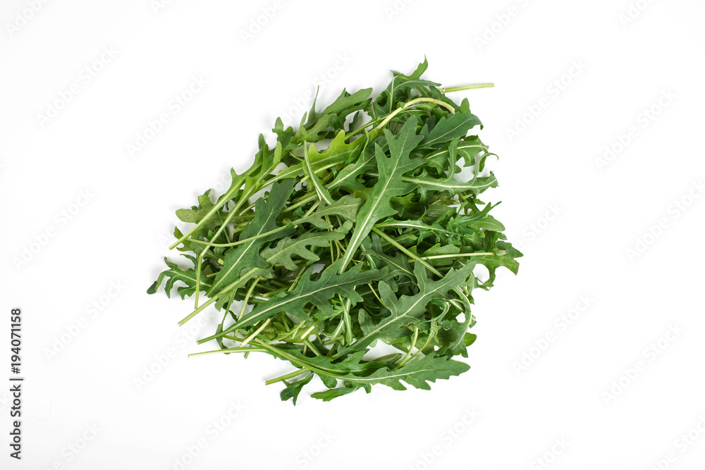 green fresh ruccola isolated on white background, close up studio shot green fresh ruccola isolated on white background, close up studio shot