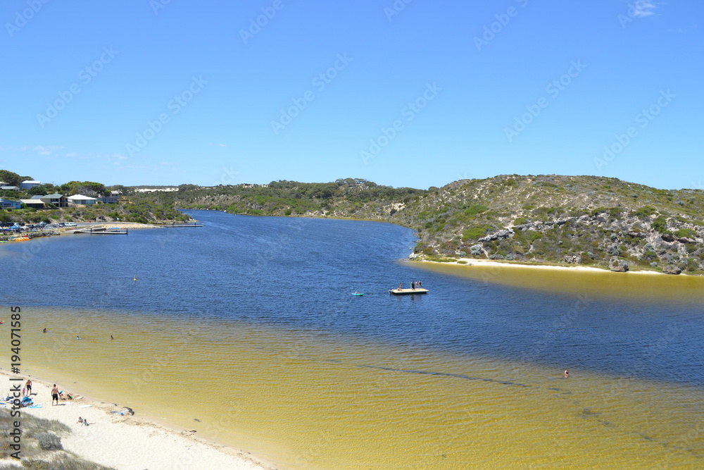 Tourism summer holiday destination western Australia Moore river white sand dark blue beach beach