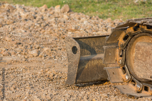 Bulldozer (Continuous Tracked Tractor) parking on soil at construction site © TS Photographer