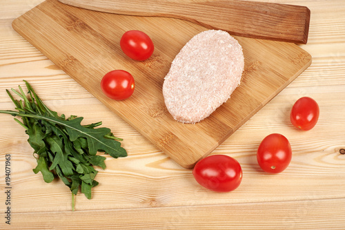 concept of healthy food, dietary chicken cutlets and a set of green salad