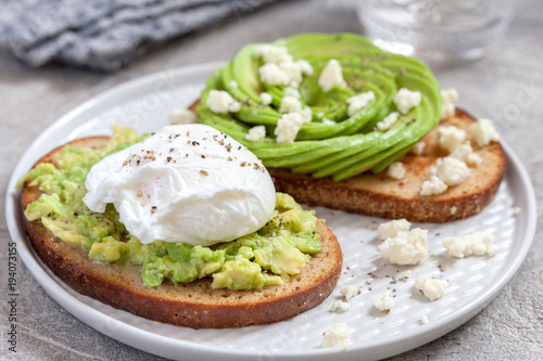 healthy breakfast toasts with avocado and egg