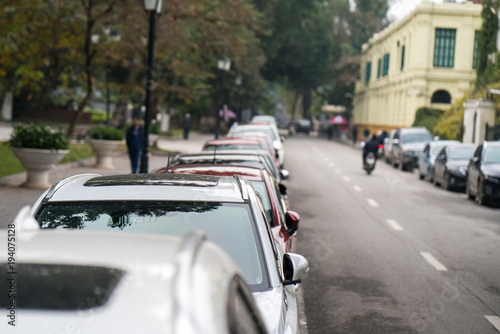 Cars parked on the urban street side