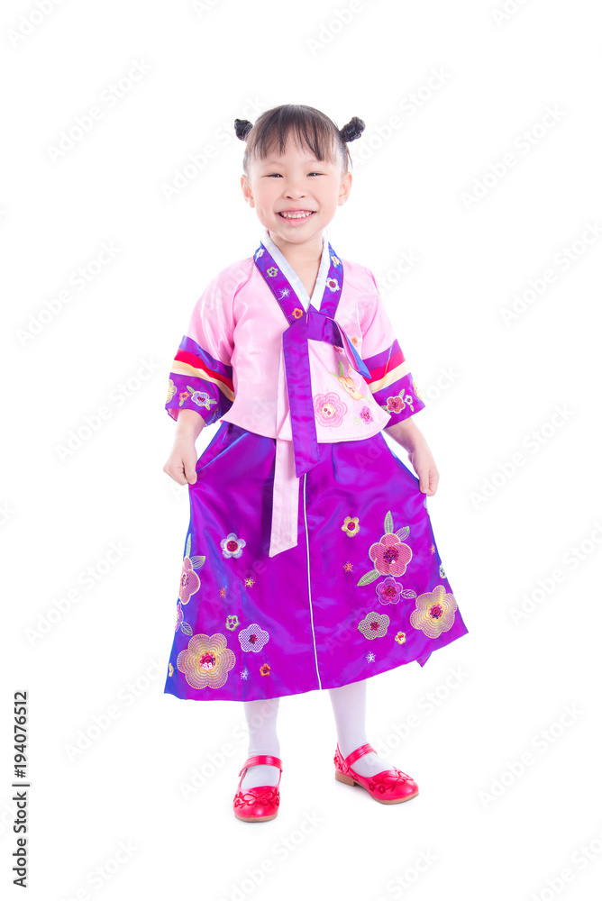 Full length shot of a little asian girl wearing korean traditional costume and smiles isolated over white background Full length shot of a little asian girl wearing korean traditional costume and smiles isolated over white background