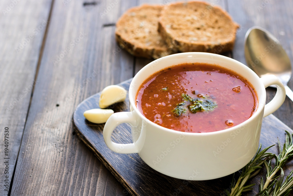 Thick Italian soup minestrone on a wooden table Thick Italian soup minestrone on a wooden table