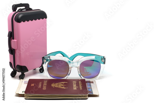 Pink luggage, Thai passport...