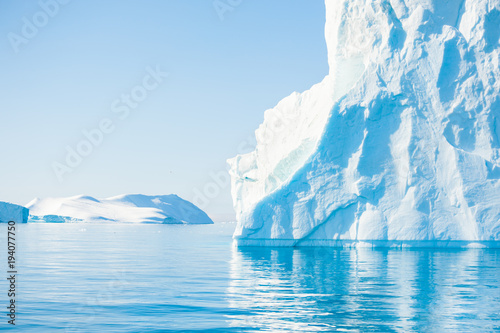 Big blue icebergs in the Ilulissat icefjord, Greenland