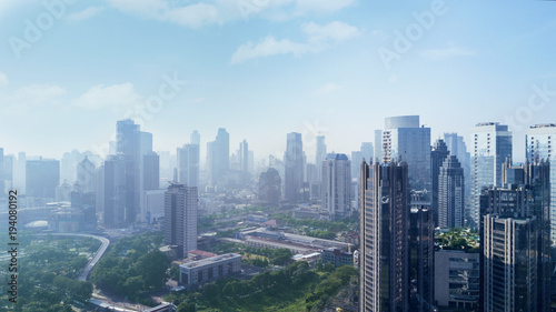 Skyscrapers with air pollution © Creativa Images