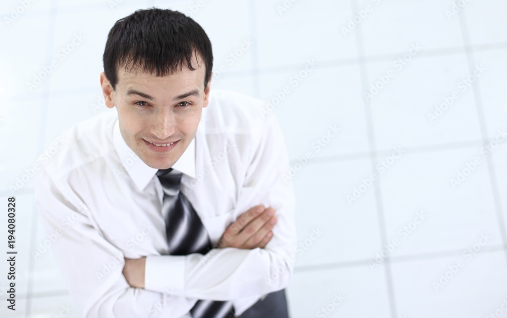 view from the top: portrait of smiling businessman view from the top: portrait of smiling businessman