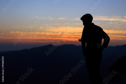 Silhouette of man on sunset. Element of design.