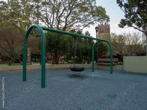 Tire swing in urban playground photo