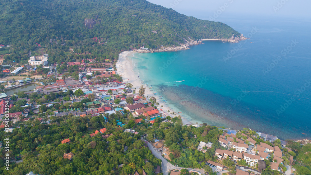 Aerial view from the drone on the sand beach of Haad Rin, Koh Phangan island, Thailand