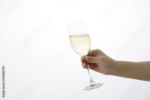 女性の手　シャンパン　乾杯　Champagne