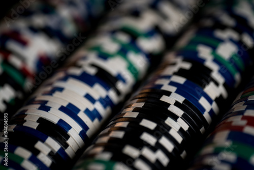 High contrast image of casino roulette and poker chips