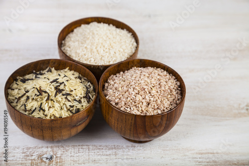 Three bowls with different varieties of rice