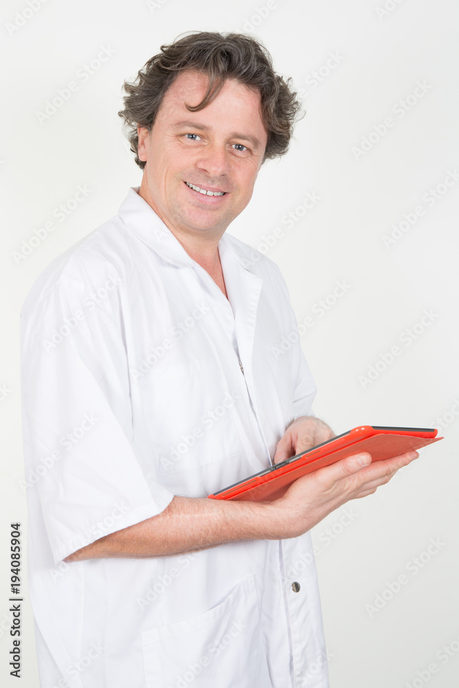 male medical worker using tablet computer in hospital male medical worker using tablet computer in hospital