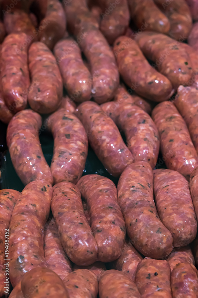 Raw sausageclose up. Store display. Butcher display. Raw sausageclose up. Store display. Butcher display.