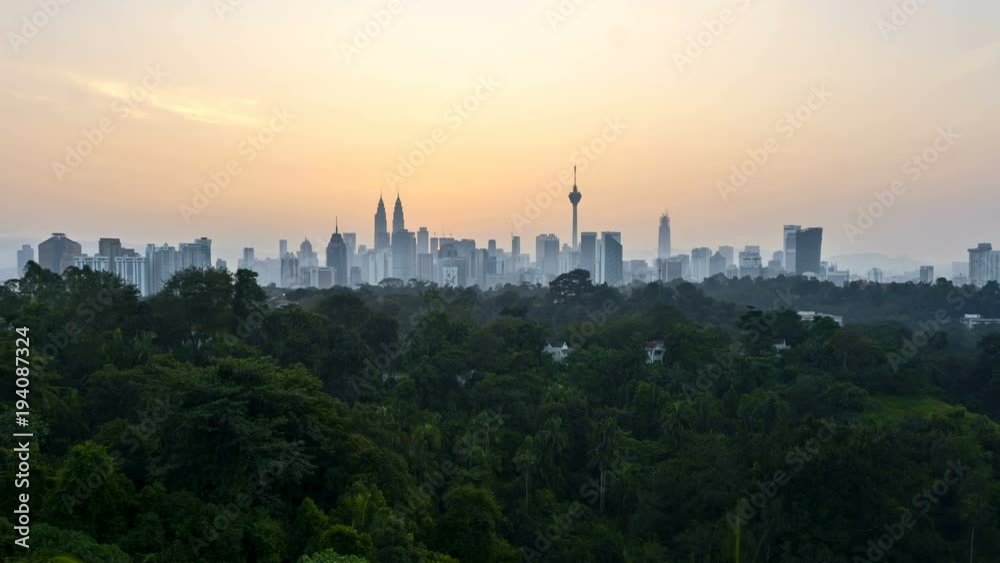 Sunrise at Kuala Lumpur city skyline from distance view. Zoom in Sunrise at Kuala Lumpur city skyline from distance view. Zoom in