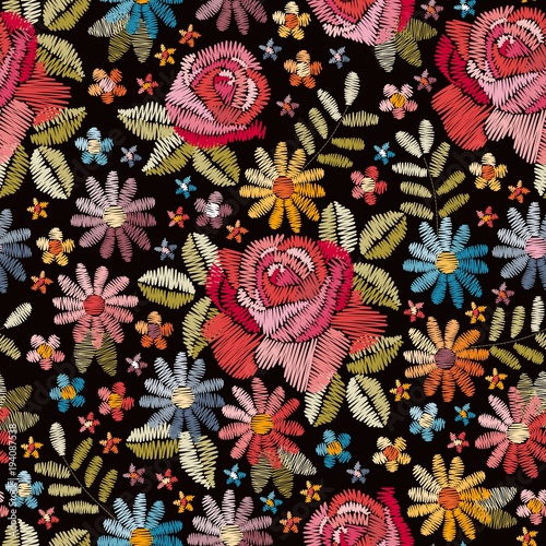 Embroidery seamless pattern with beautiful colorful flowers. Floral backgroun...