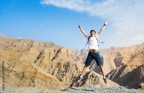 Man jumping on the mountain top