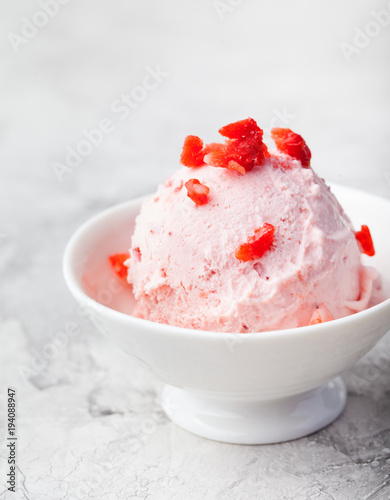 Strawberry sundae ice cream in bowl