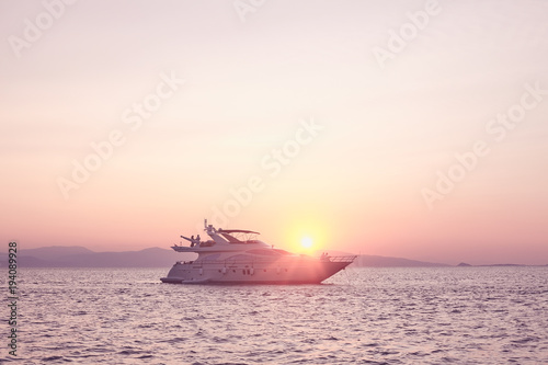 Couples on yacht at sunset © Sergey Furtaev
