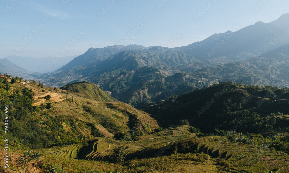 landscape with scenic mountains and green vegetation on hills at Sa Pa, Vietnam