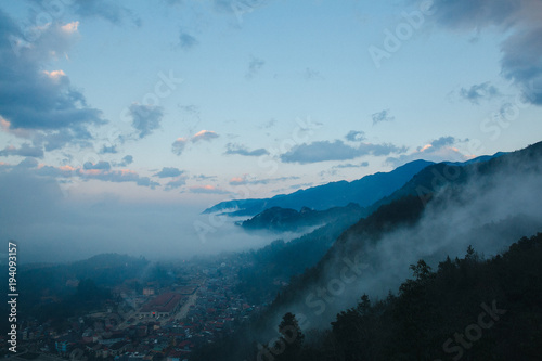 town in beautiful mountains and clouds at evening in Sa Pa, Vietnam