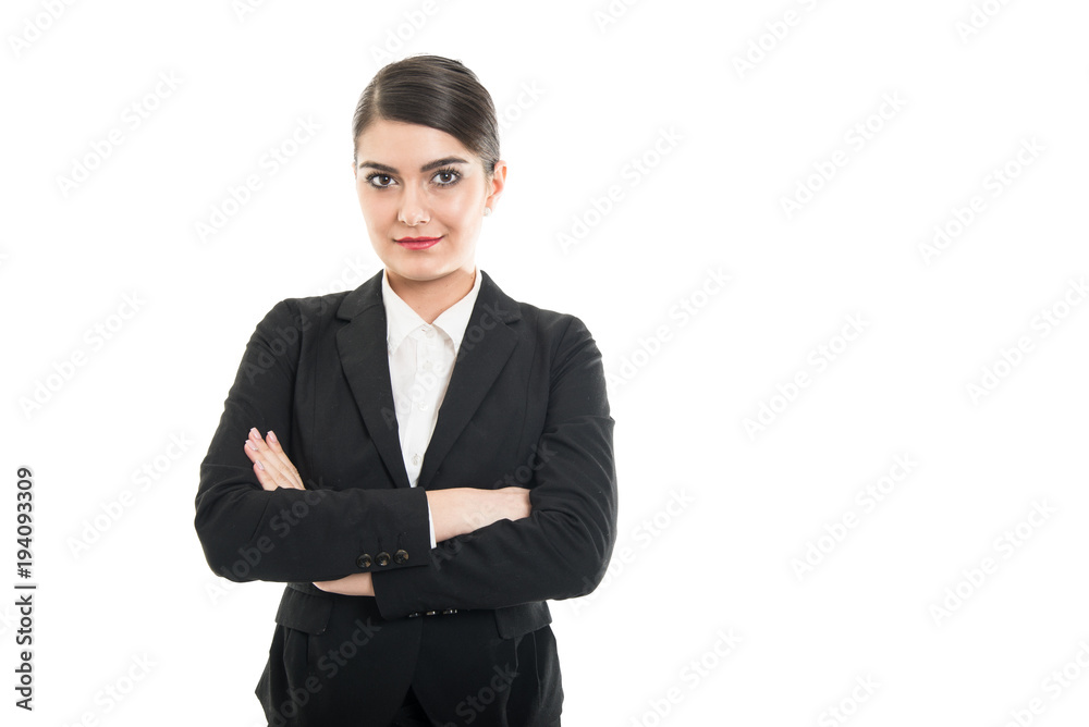 Beautiful female flight attendant standing with arms crossed Beautiful female flight attendant standing with arms crossed