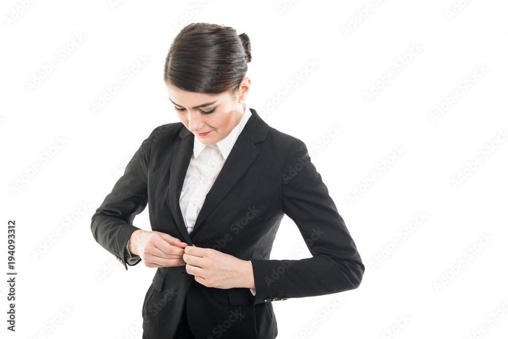 Beautiful female flight attendant buttoning her jacket Beautiful female flight attendant buttoning her jacket