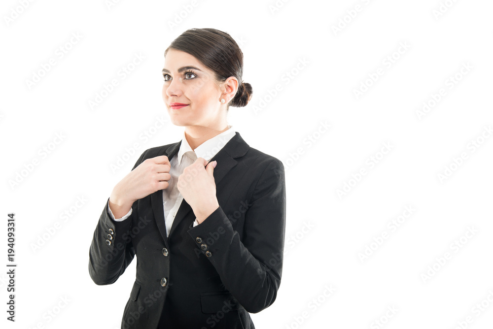 Beautiful female flight attendant arranging her jacket Beautiful female flight attendant arranging her jacket