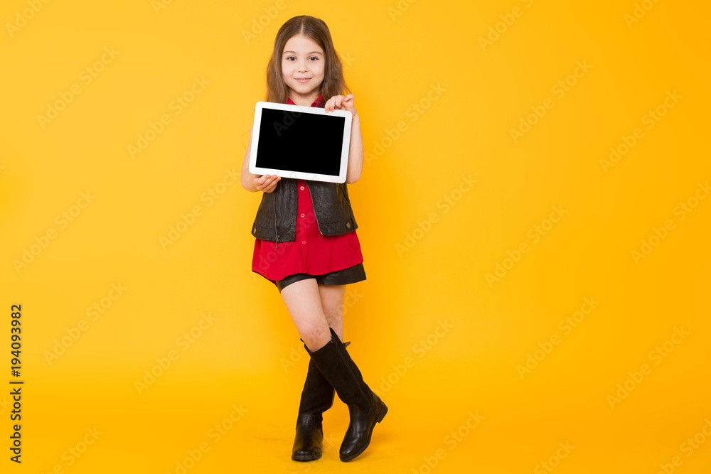 Little girl with tablet computer