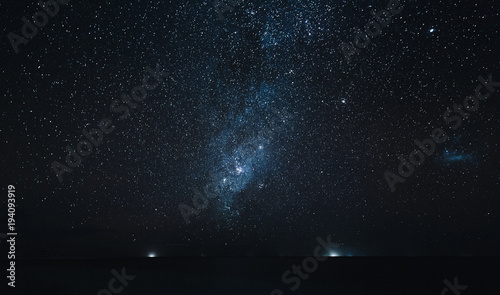 amazing starry sky above ocean at night, Thoddoo island, Maldives