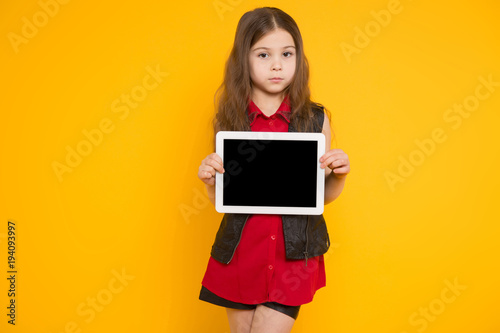Little girl with tablet computer