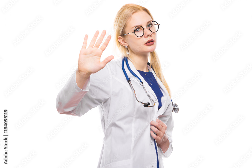 Woman doctor in white coat shows her palm