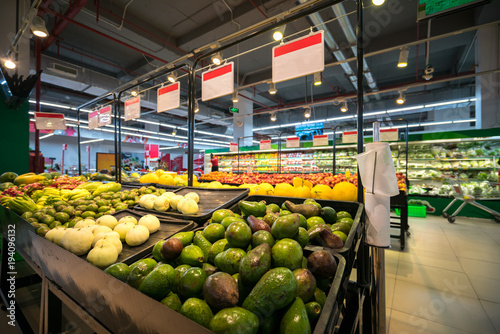 Fresh fruits on shelf in supermarket.